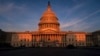 U.S. -- The rising sun divides the West Front of the U.S. Capitol in Washington, September 25, 2019