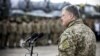 UKRAINE – Ukraine's President Petro Poroshenko delivers a speech during a ceremony to hand over weapons and military vehicles to servicemen of the Ukrainian armed forces at an airforce base near Zhytomyr, December 21, 2018