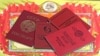 GENERIC – Old Soviet documents on a red background 